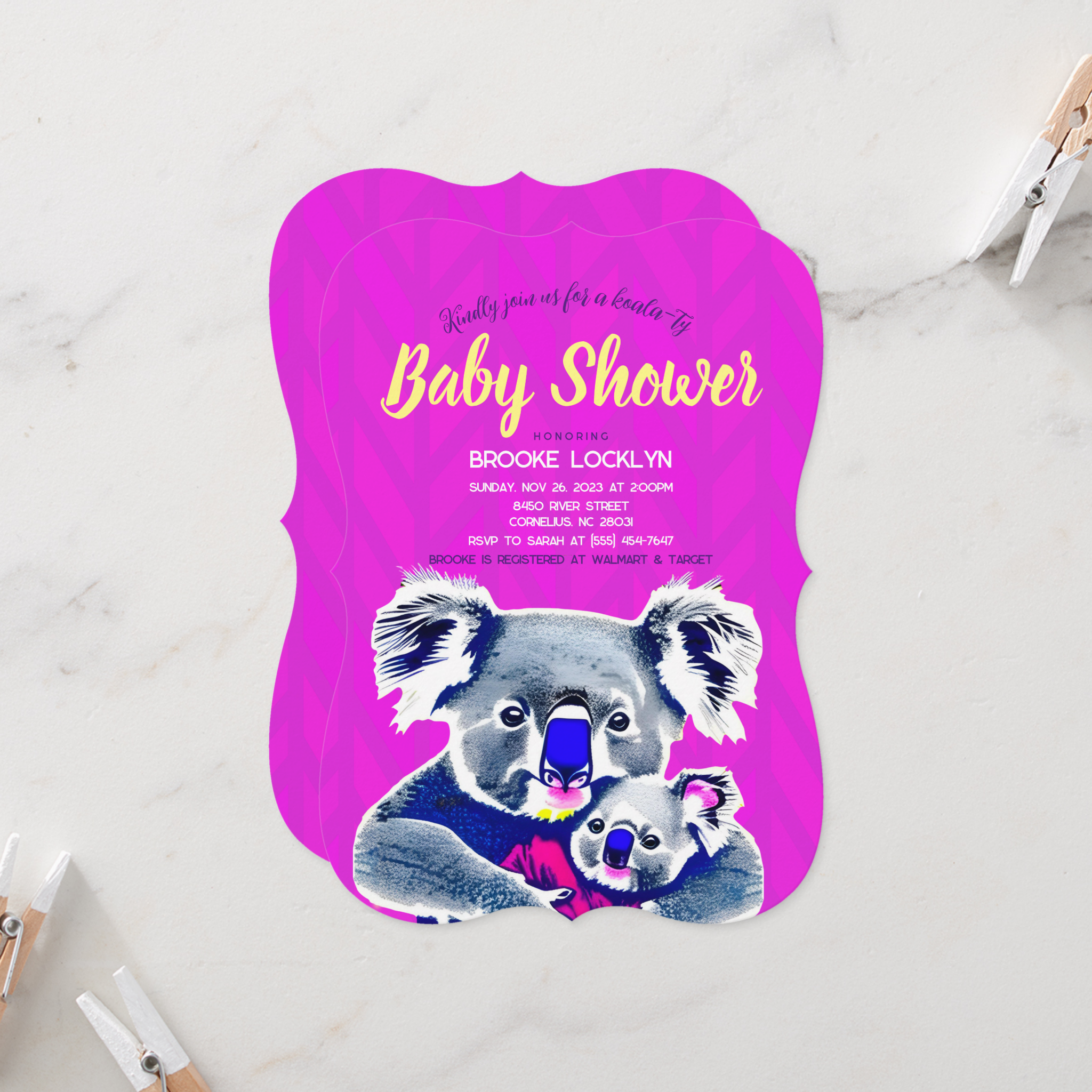 An image of a pink baby shower invitation with a mother and baby koala.